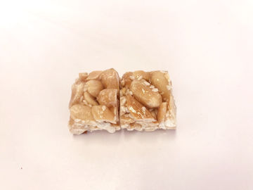 Il dado pieno del caramello di nutrizione ragruppa piccoli il gusto croccante di scricchiolio misto del pezzo cinque dadi