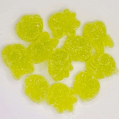 Dolci gommosi a forma di frutta a colori misti con rivestimento di zucchero