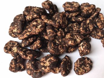 La struttura croccante di sapore dolce matto della fava del cioccolato tiene nello stato fresco