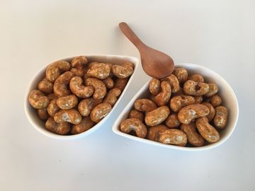 L'anacardio a terra crudo fa un spuntino l'OEM pieno di nutrizione dell'anacardio piccante condito peperoncino rosso saporito di Sriracha